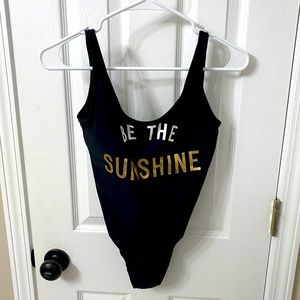 Black one piece with high hips